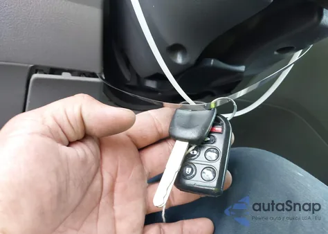 2010 Honda Odyssey Exl z USA, uszkodzony, nr VIN 5FNRL3H79AB114308